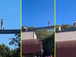 Heroico rescate: un hombre salva a un niño en rieles de montaña rusa.