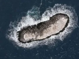 Descubrimiento de una isla desconocida en la Antártida por un equipo internacional.