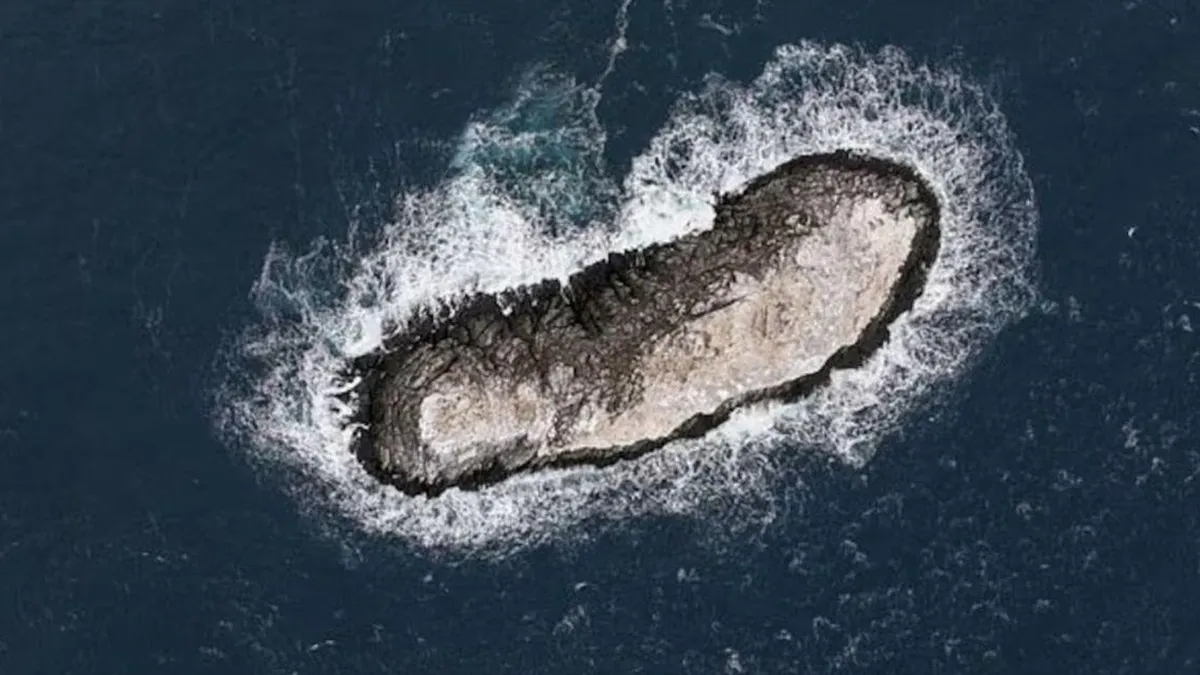 Descubrimiento de una isla desconocida en la Antártida por un equipo internacional.